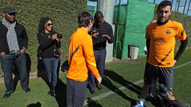 Justin Tuck and Leo Messi