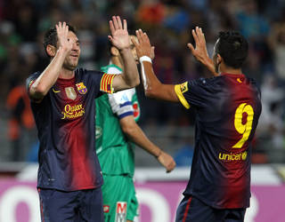 Messi i Alexis celebren un dels cinc gols de la primera meitat / FOTO: MIGUEL RUIZ-FCB