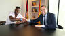 Song signs his contract 