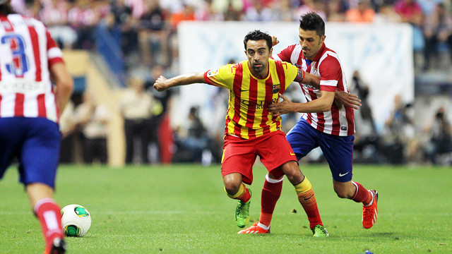 Xavi, amb l'exblaugrana Villa, que torna al Camp Nou / FOTO: MIGUEL RUIZ-FCB