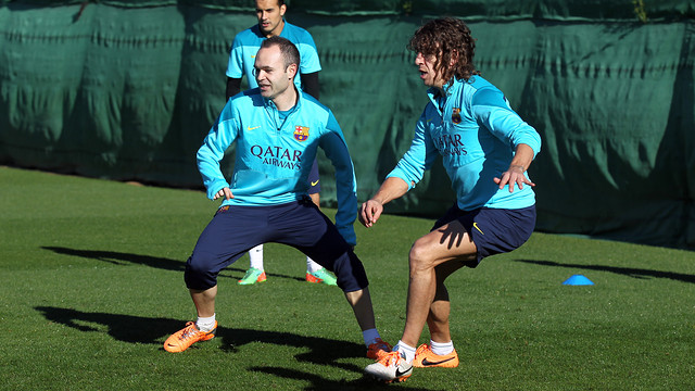 Iniesta and Puyol at this Monday's training. PHOTO: MIGUEL RUIZ-FCB.